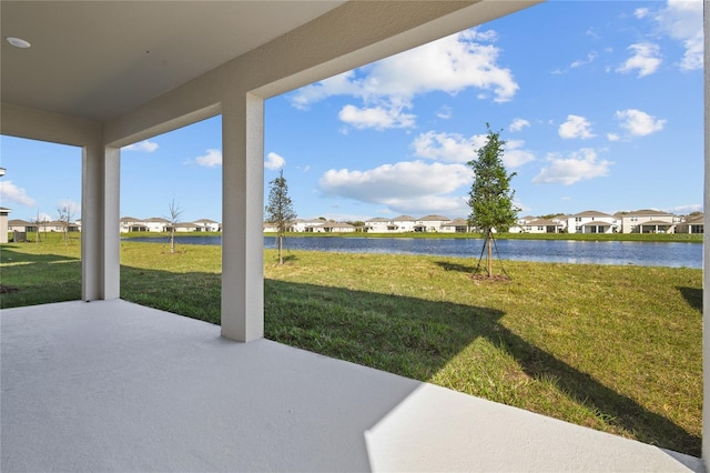 exterior space with a water view and a residential view