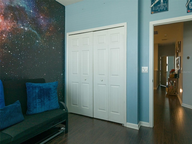 living area featuring dark wood-type flooring