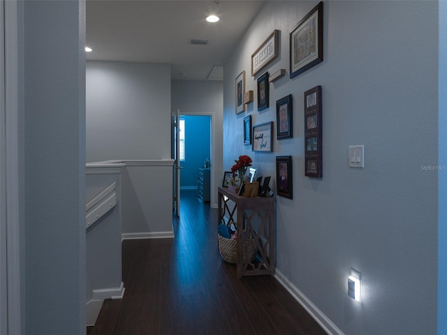 hall with dark hardwood / wood-style floors