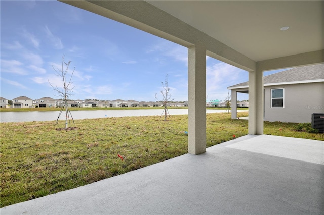 view of patio featuring a water view