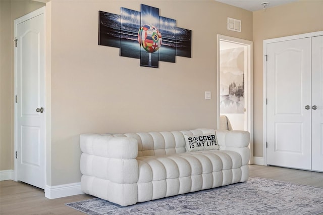 living room with wood-type flooring