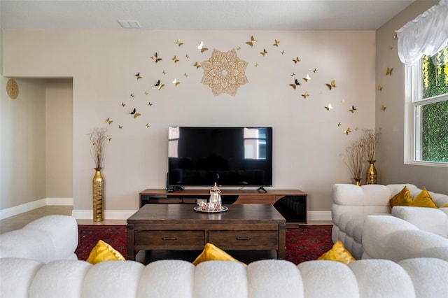 living room featuring a wealth of natural light