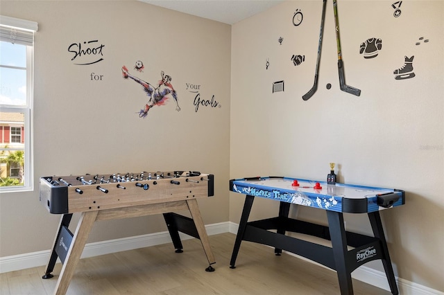 playroom featuring hardwood / wood-style floors and plenty of natural light