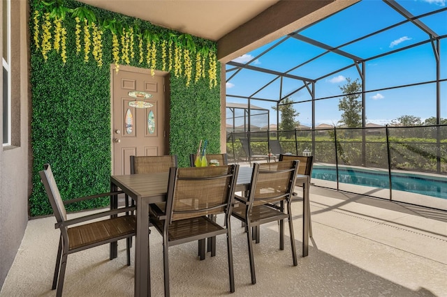 view of patio / terrace featuring a lanai