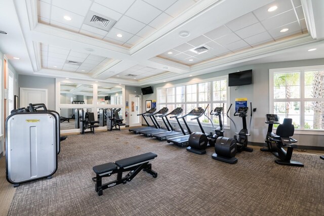 workout area featuring carpet, ornamental molding, and coffered ceiling