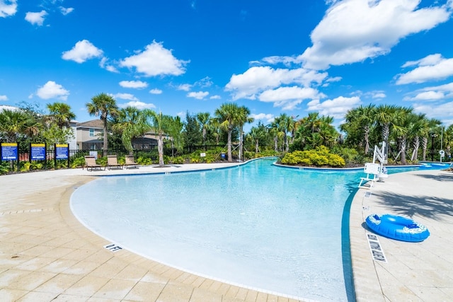 view of swimming pool featuring a patio