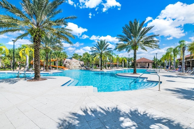 view of swimming pool with a patio area