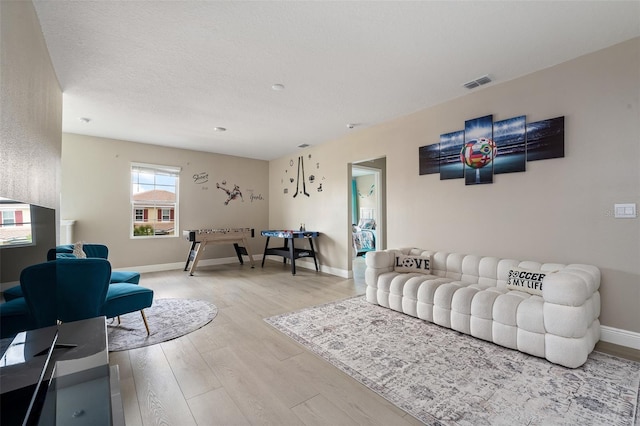 living room with hardwood / wood-style flooring