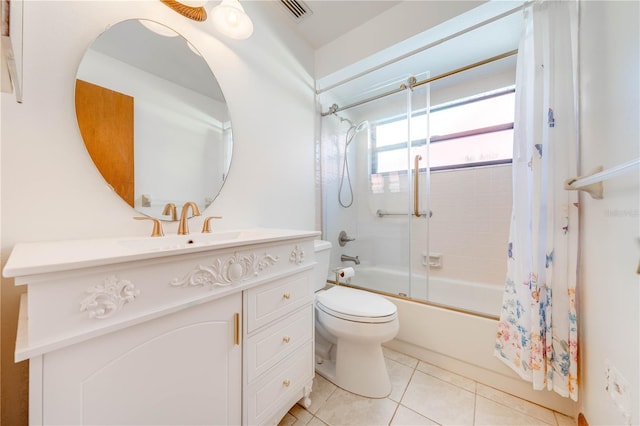 full bathroom featuring tile patterned flooring, vanity, toilet, and shower / tub combo