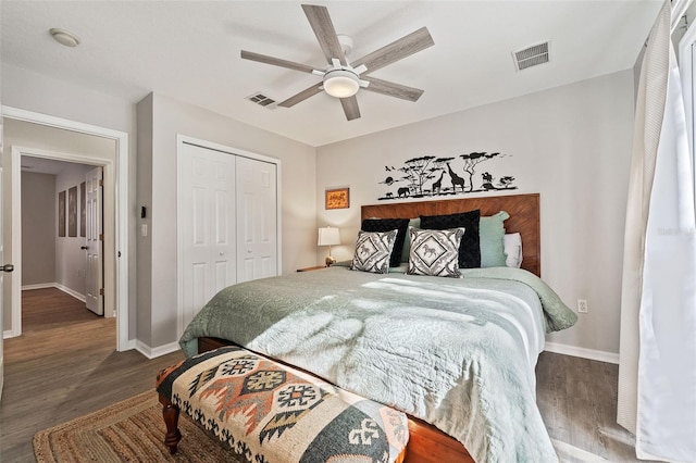 bedroom featuring ceiling fan, a closet, and wood-type flooring