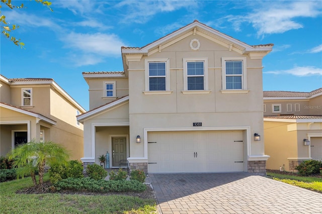 view of front of home with a garage