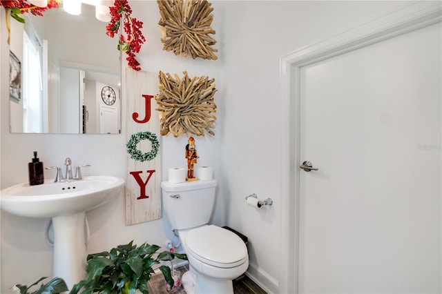 bathroom with sink and toilet