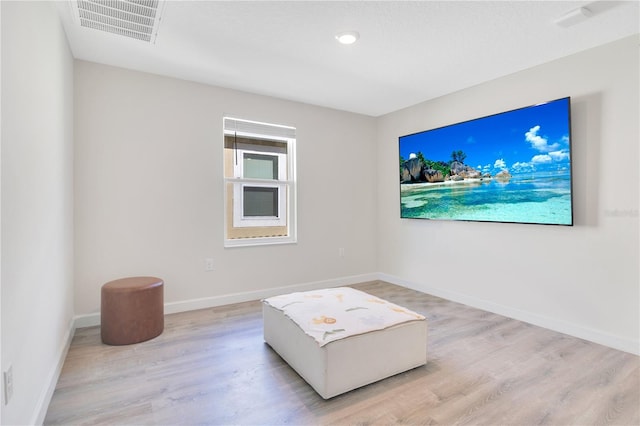 living area featuring light hardwood / wood-style flooring