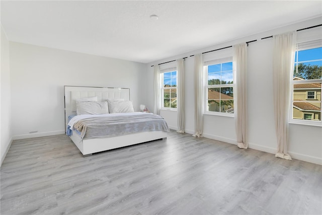 bedroom featuring light hardwood / wood-style flooring