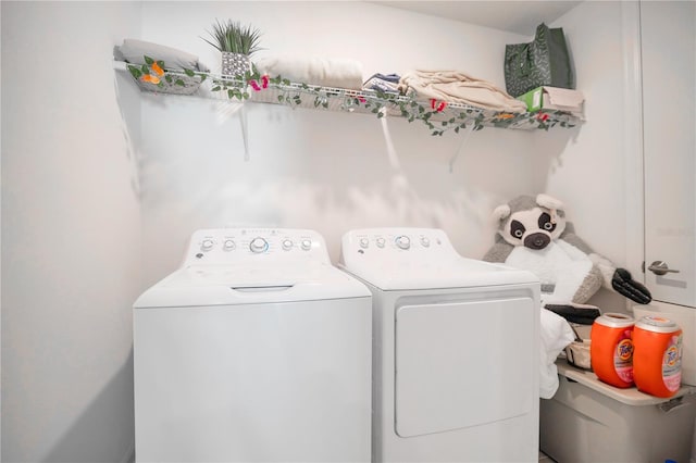 laundry area with washer and clothes dryer