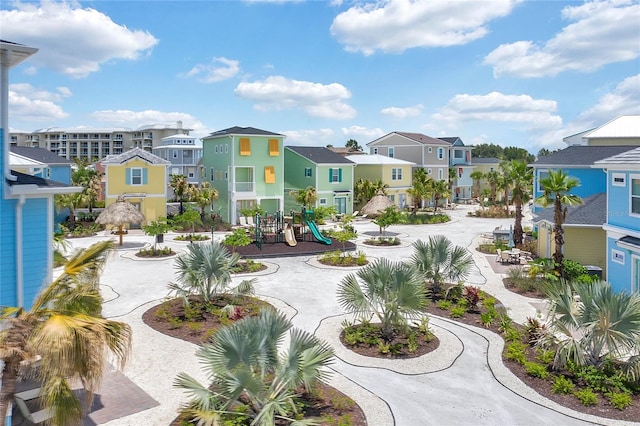 view of home's community featuring a playground