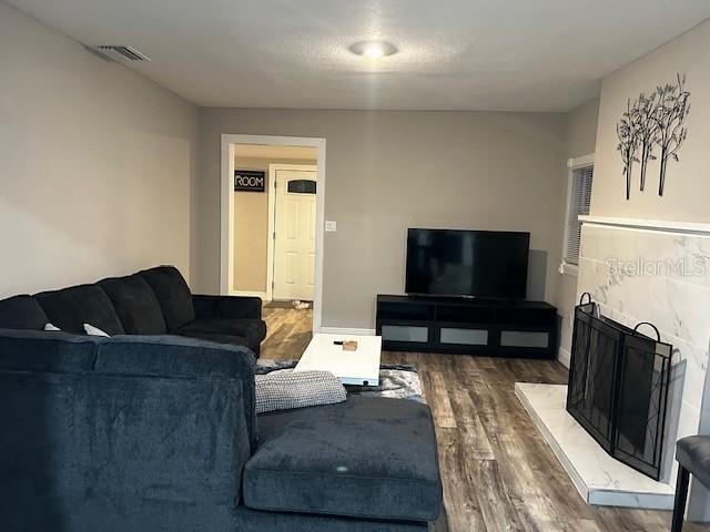 living room with dark wood-type flooring