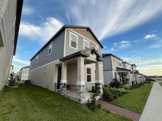 view of property exterior featuring a lawn