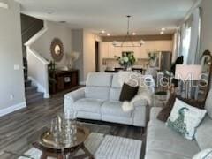 living room featuring dark hardwood / wood-style floors