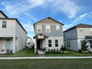 view of property with a front lawn