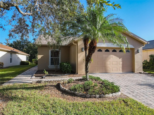 view of front of home featuring a garage