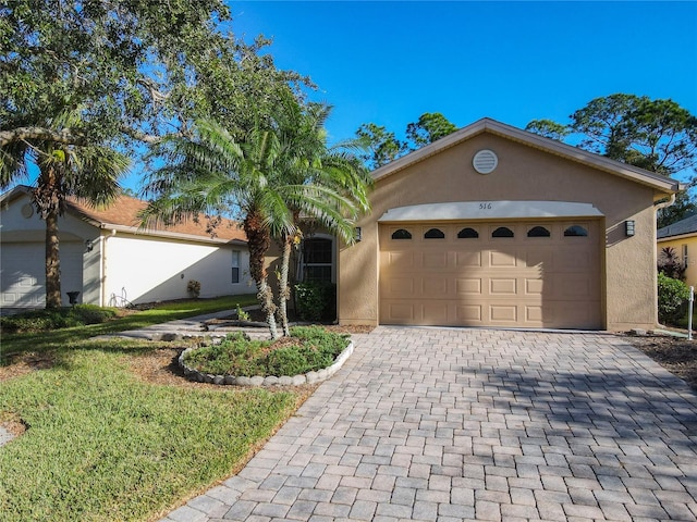 view of front of house with a garage