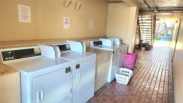 laundry room with washer and dryer