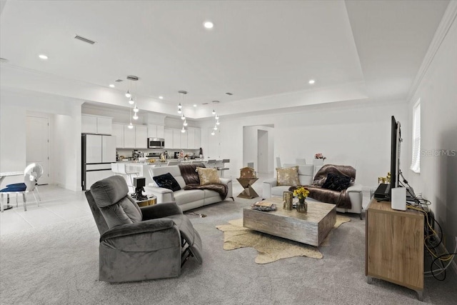 living room with light colored carpet and crown molding