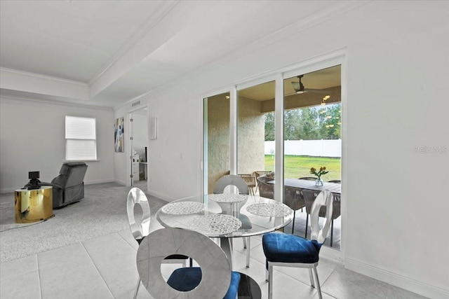 13795 SW 137th Ct, Newberry, FL 32669 - carpeted dining area with ornamental molding and a raised ceiling