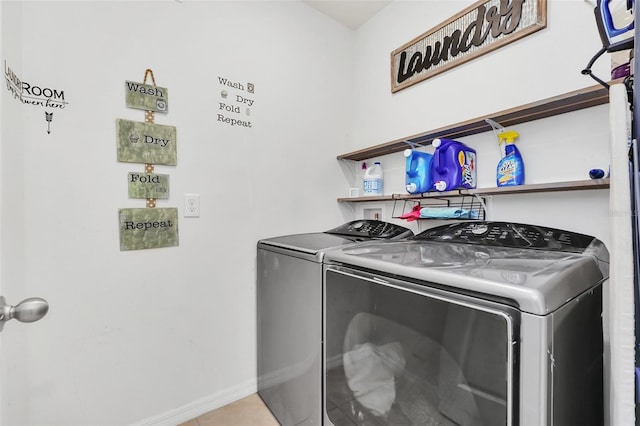 laundry room featuring washer and clothes dryer