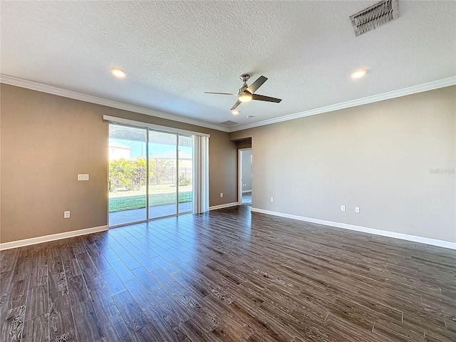 empty room featuring ceiling fan, dark wood-type flooring, a textured ceiling, and ornamental molding