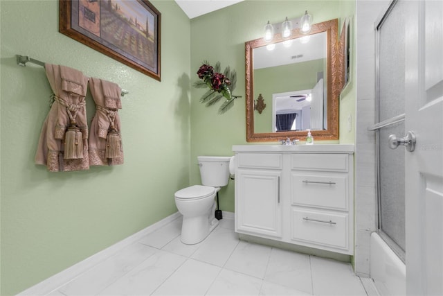 full bathroom with vanity, shower / bath combination with glass door, tile patterned flooring, ceiling fan, and toilet