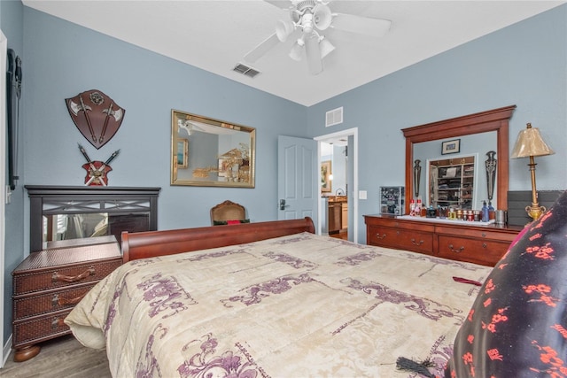 bedroom featuring wood-type flooring and ceiling fan