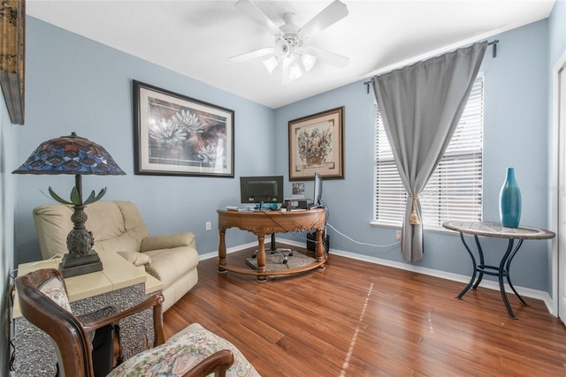 office space with hardwood / wood-style floors and ceiling fan