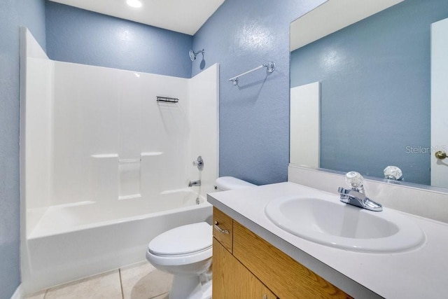 full bathroom featuring tile patterned flooring, vanity, bathing tub / shower combination, and toilet