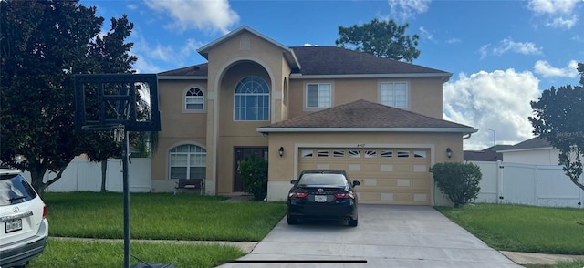 view of front of house featuring a front lawn and a garage