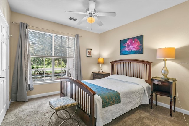 carpeted bedroom with ceiling fan