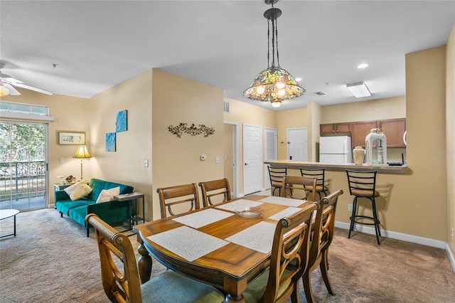 3176 Feltrim Pl Unit 102, Kissimmee, FL 34747 - dining room featuring carpet flooring, a ceiling fan, and recessed lighting