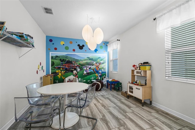 playroom featuring light hardwood / wood-style floors