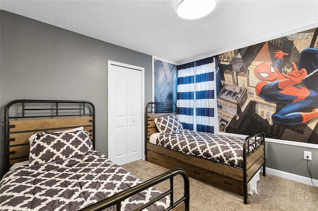 bedroom with carpet floors and a closet