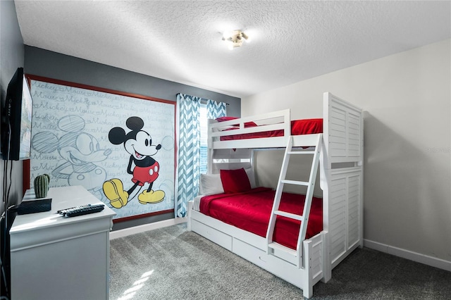 carpeted bedroom with a textured ceiling