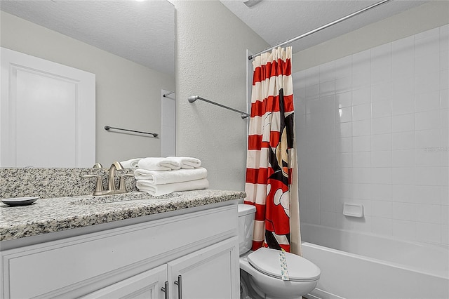 full bathroom featuring vanity, shower / bathtub combination with curtain, a textured ceiling, and toilet