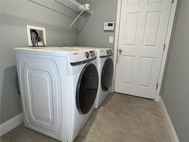 washroom featuring independent washer and dryer