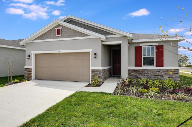 craftsman inspired home featuring stucco siding, a front yard, a garage, stone siding, and driveway