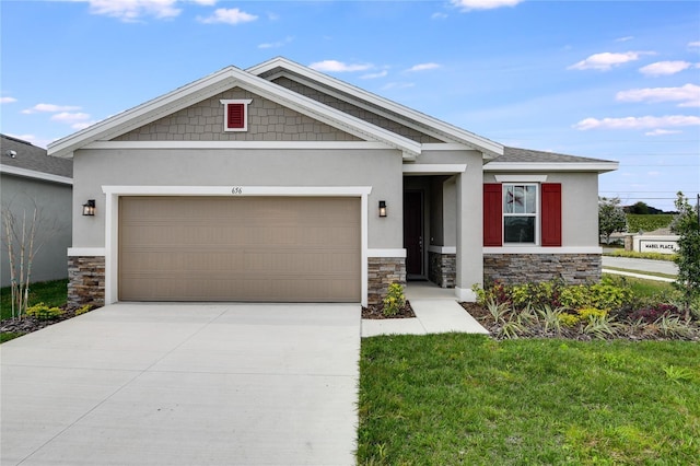 craftsman-style house with stone siding, an attached garage, driveway, and stucco siding