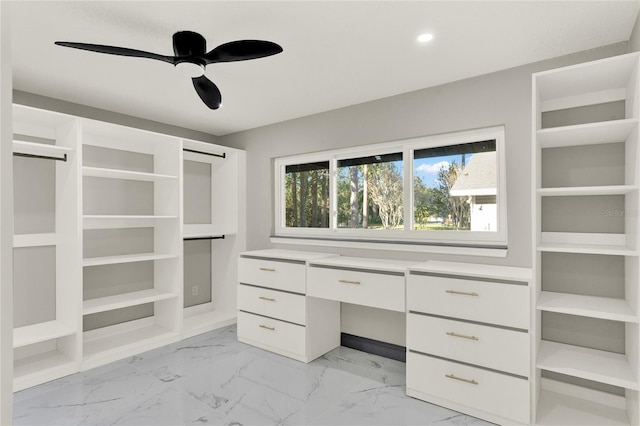 spacious closet featuring ceiling fan