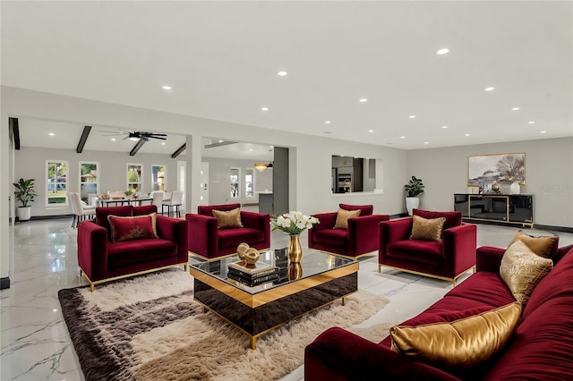 living room with vaulted ceiling with beams and ceiling fan