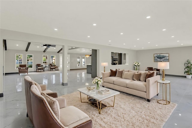 living room featuring vaulted ceiling with beams and ceiling fan