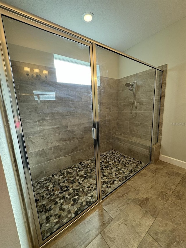 bathroom featuring an enclosed shower