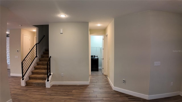 interior space with wood finished floors and baseboards